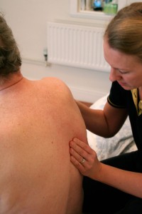 massaging a stroke patient's back